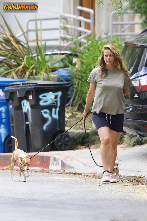 Alicia Silverstone taking a stroll near the $597K four-bedroom Hollywood Hills home she bought way back in 1996 photo 13