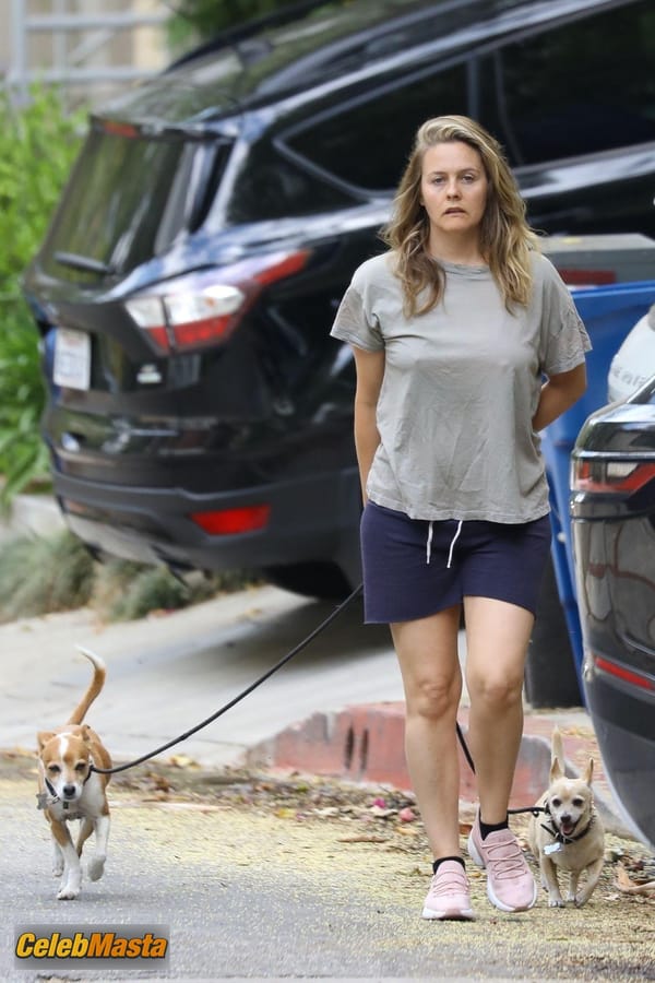 Alicia Silverstone taking a stroll near the $597K four-bedroom Hollywood Hills home she bought way back in 1996 photo 16