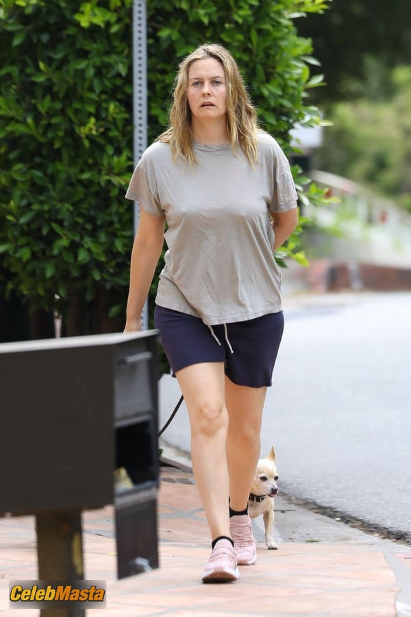 Alicia Silverstone taking a stroll near the $597K four-bedroom Hollywood Hills home she bought way back in 1996 photo 18