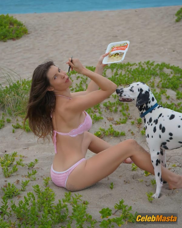 Amanda Cerny Poses In A Bikini With Her Dog For A Photoshoot photo 4
