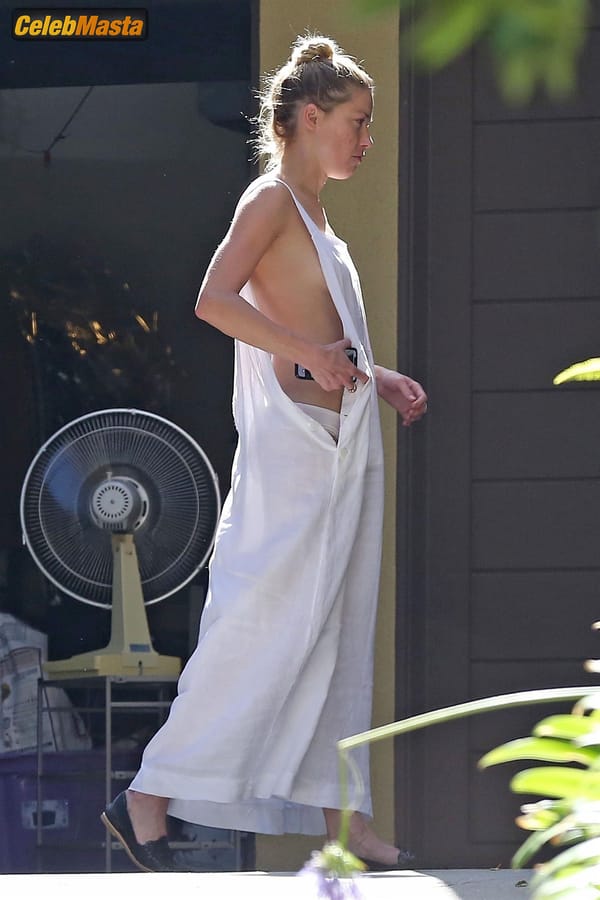 Amber Heard Nip Slip exposes Boob while cleaning out her garage in LA photo 30