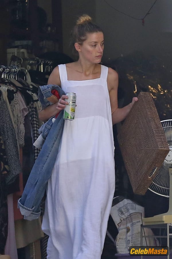 Amber Heard Nip Slip exposes Boob while cleaning out her garage in LA photo 39