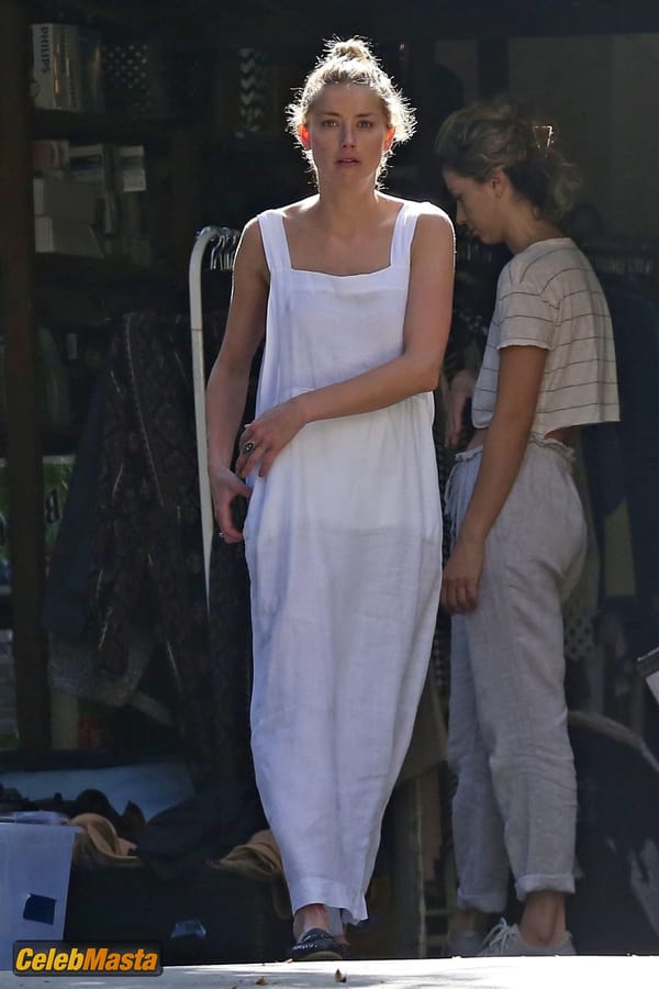Amber Heard Nip Slip exposes Boob while cleaning out her garage in LA photo 44