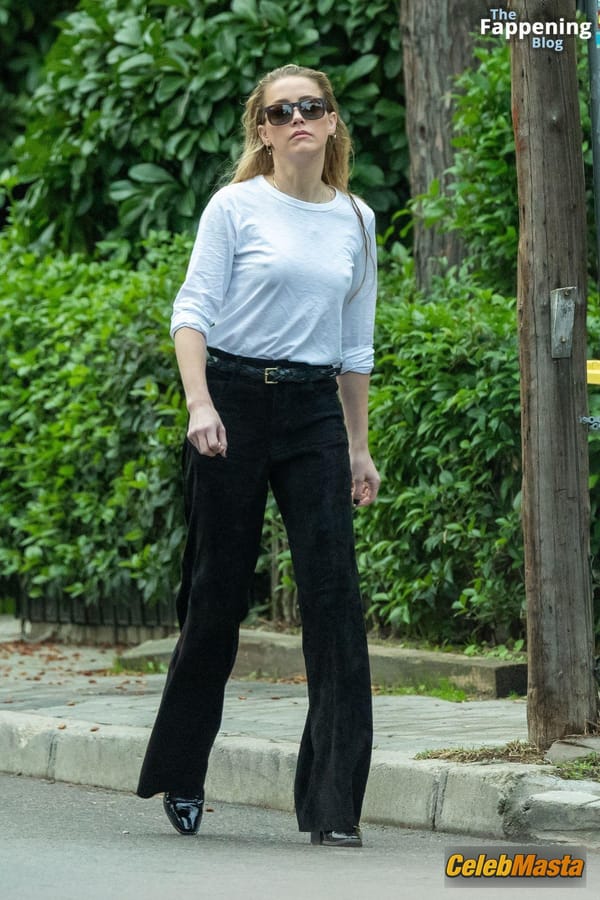 Amber Heard Pokies in Madrid photo 5