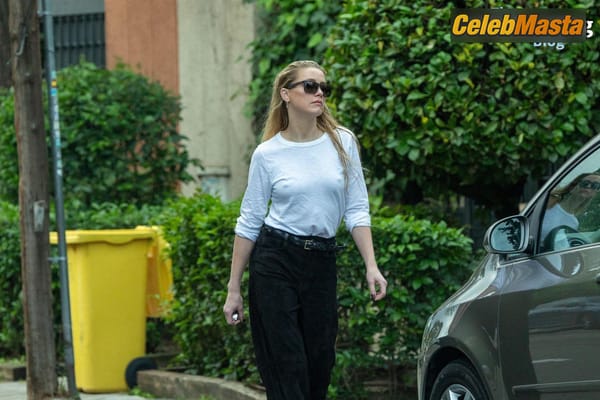 Amber Heard Pokies in Madrid photo 6