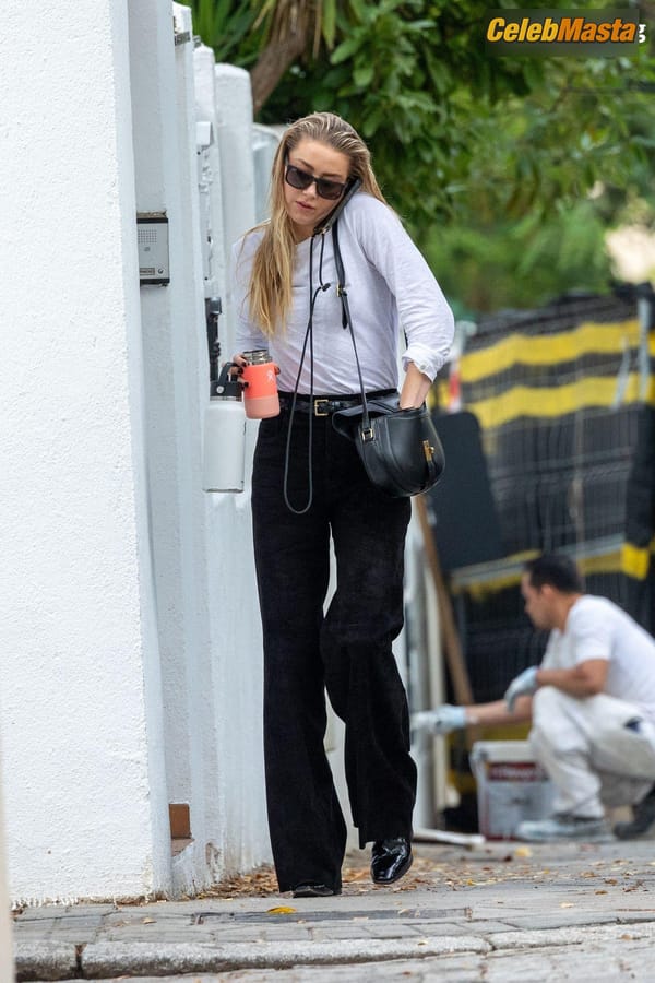 Amber Heard Pokies in Madrid photo 9