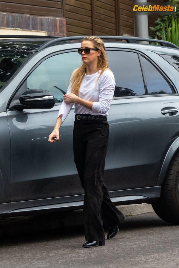 Amber Heard Pokies in Madrid photo 10