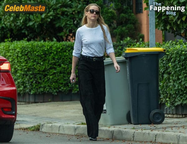 Amber Heard Pokies in Madrid photo 13
