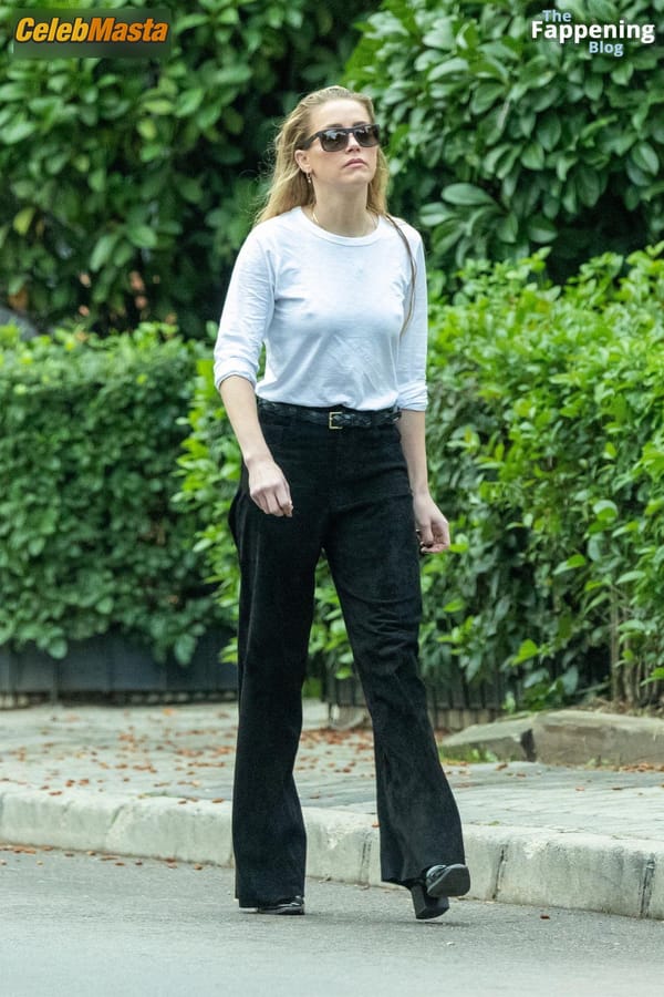Amber Heard Pokies in Madrid photo 14