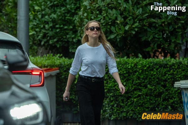Amber Heard Pokies in Madrid photo 16
