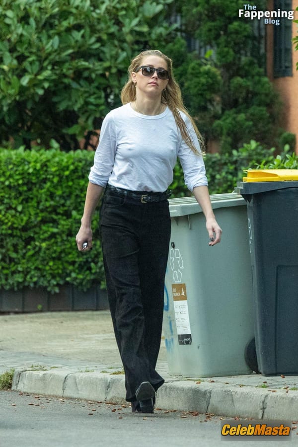 Amber Heard Pokies in Madrid photo 21