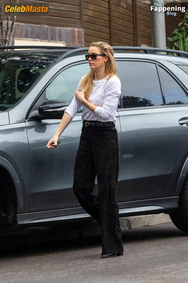 Amber Heard Pokies in Madrid photo 23