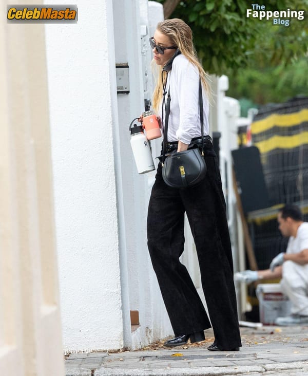Amber Heard Pokies in Madrid photo 24