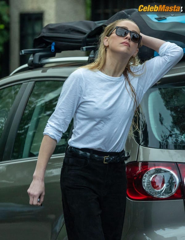 Amber Heard Pokies in Madrid photo 25