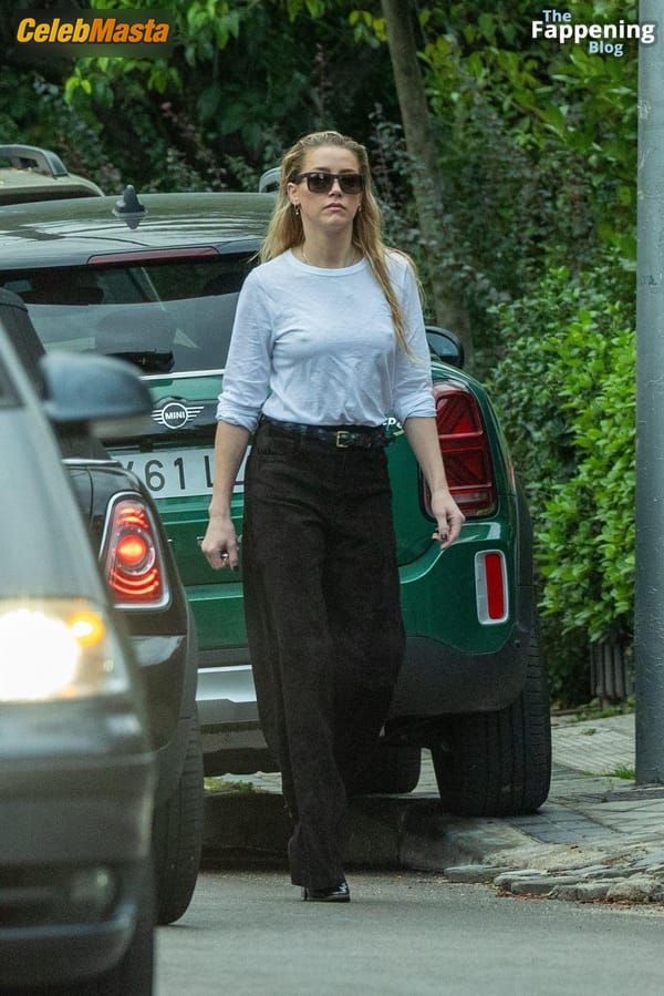 Amber Heard Pokies in Madrid photo 26