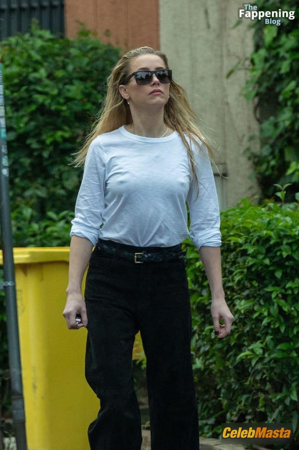 Amber Heard Pokies in Madrid photo 27