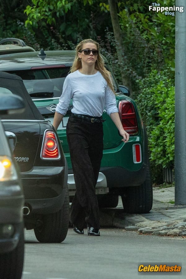Amber Heard Pokies in Madrid photo 28