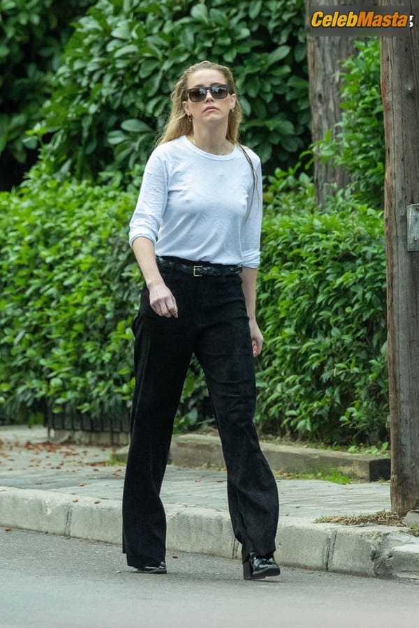 Amber Heard Pokies in Madrid photo 29