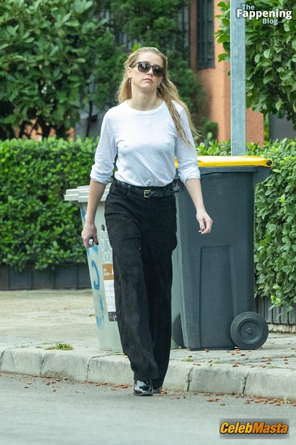 Amber Heard Pokies in Madrid photo 30