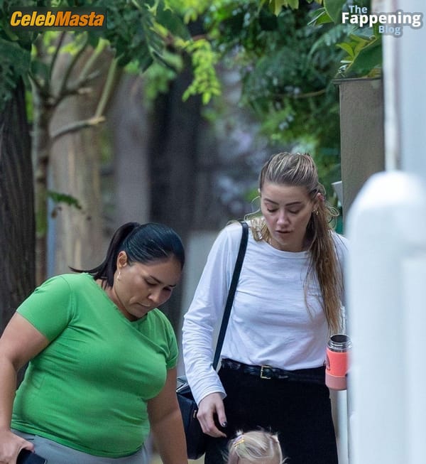 Amber Heard Pokies in Madrid photo 31