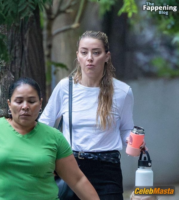 Amber Heard Pokies in Madrid photo 32