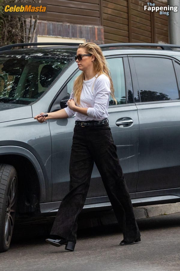 Amber Heard Pokies in Madrid photo 33