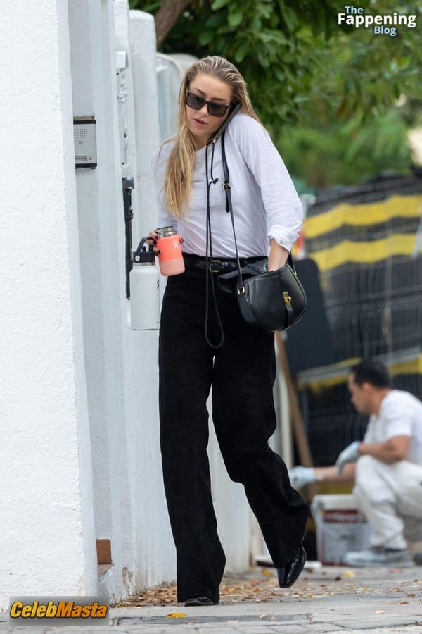 Amber Heard Pokies in Madrid photo 36