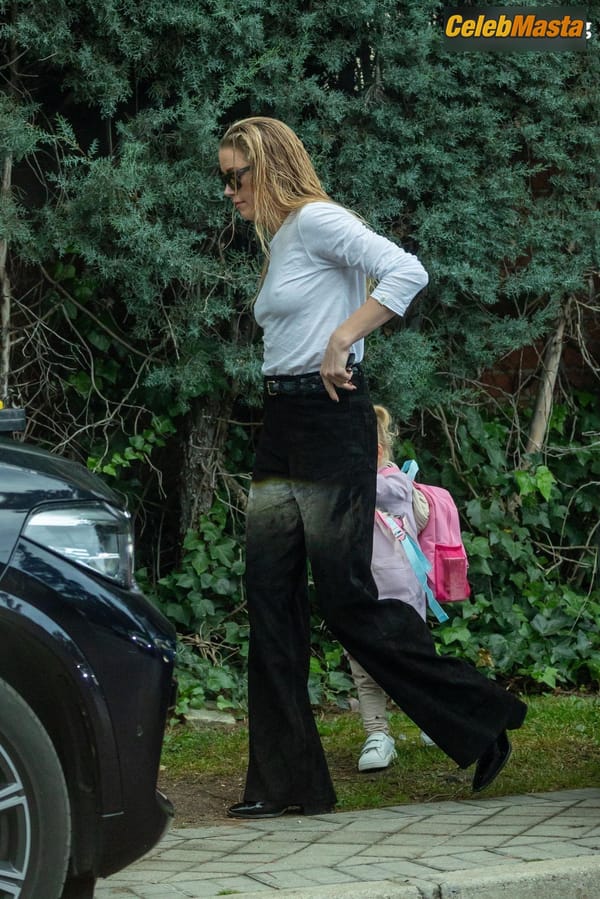 Amber Heard Pokies in Madrid photo 37