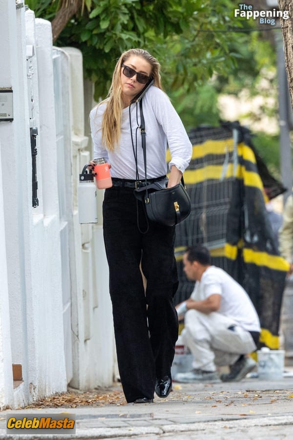Amber Heard Pokies in Madrid photo 39