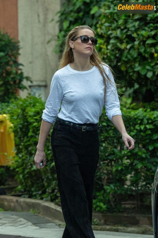 Amber Heard Pokies in Madrid photo 41