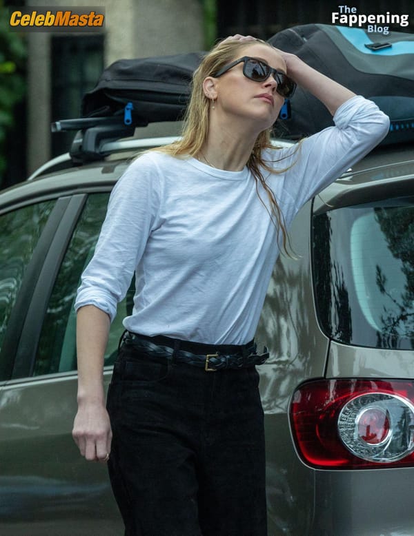 Amber Heard Pokies in Madrid photo 43