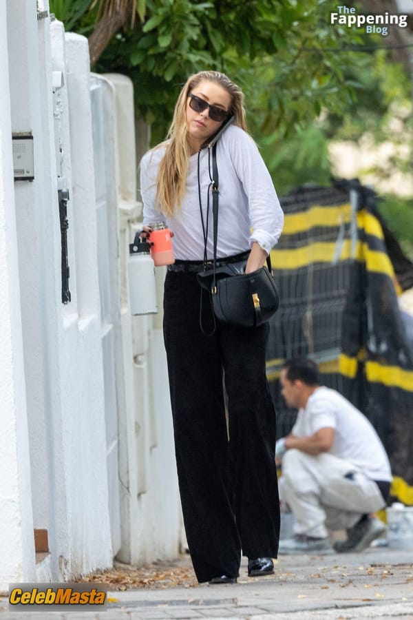 Amber Heard Pokies in Madrid photo 45