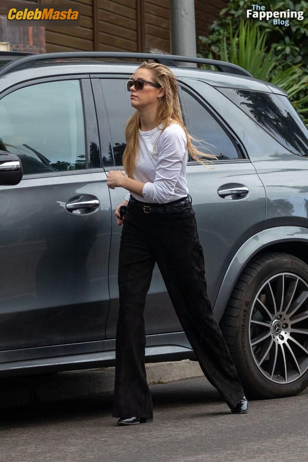 Amber Heard Pokies in Madrid photo 46