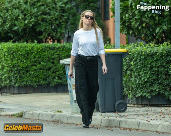 Amber Heard Pokies in Madrid photo 48