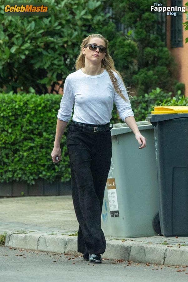 Amber Heard Pokies in Madrid photo 50