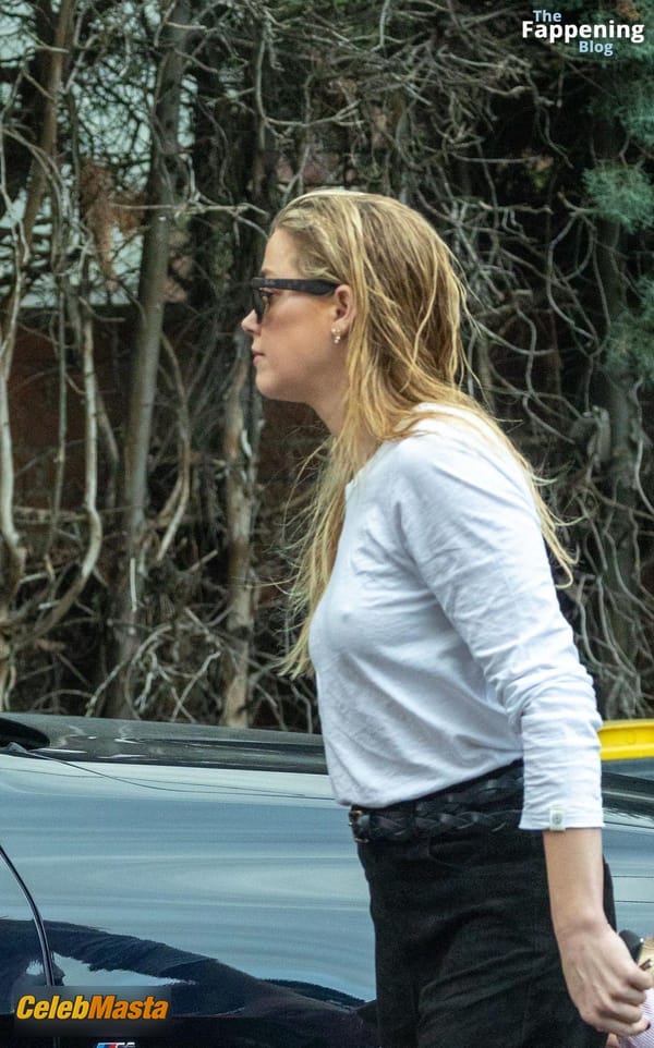 Amber Heard Pokies in Madrid photo 51