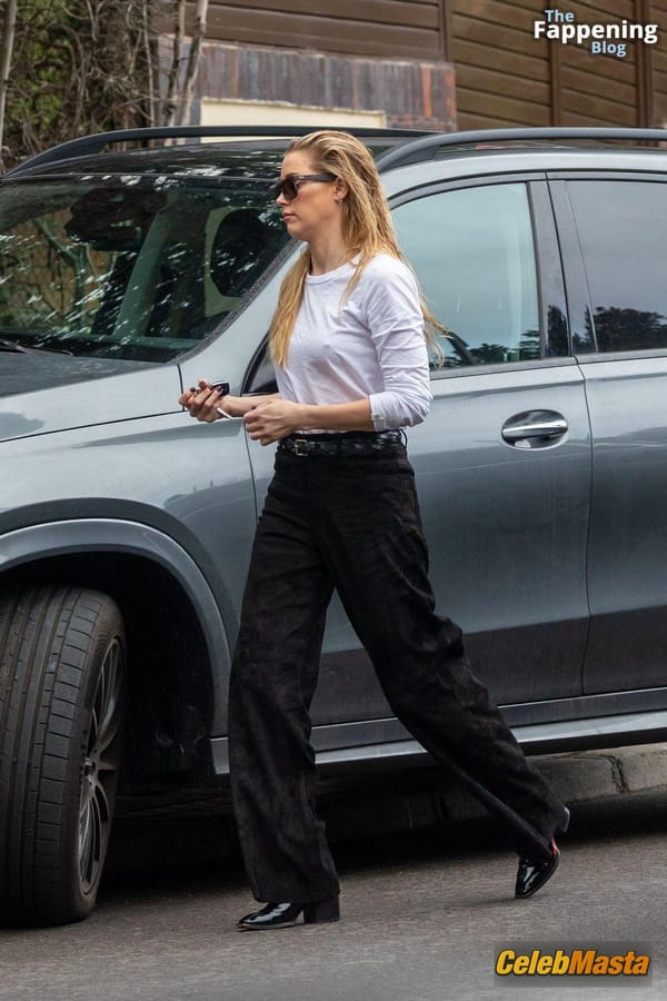 Amber Heard Pokies in Madrid photo 57
