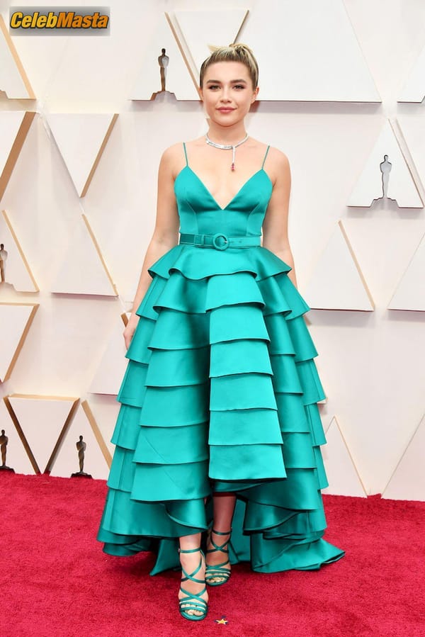 Florence Pugh poses on the red carpet wearing a turquoise dress during the Oscars arrivals at the 92nd Academy Awards in Hollywood photo 4