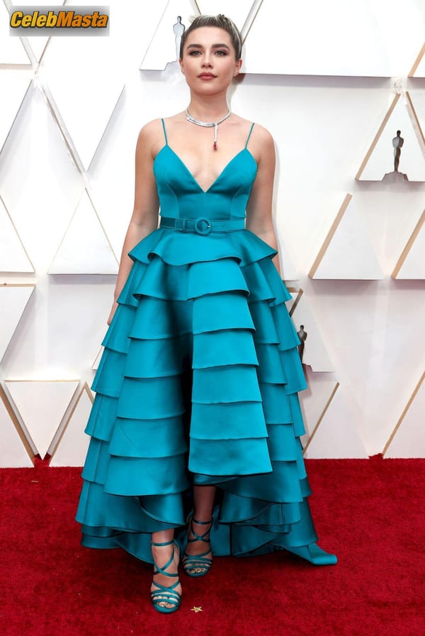 Florence Pugh poses on the red carpet wearing a turquoise dress during the Oscars arrivals at the 92nd Academy Awards in Hollywood photo 5