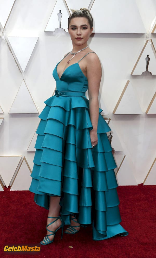 Florence Pugh poses on the red carpet wearing a turquoise dress during the Oscars arrivals at the 92nd Academy Awards in Hollywood photo 6