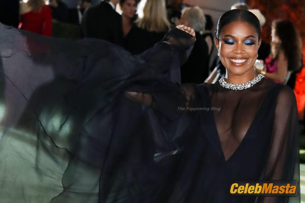 Gabrielle Union Flaunts Her Cleavage in A Black Dress at the Opening Gala of Academy Museum Motion Pictures In Los Angeles photo 9
