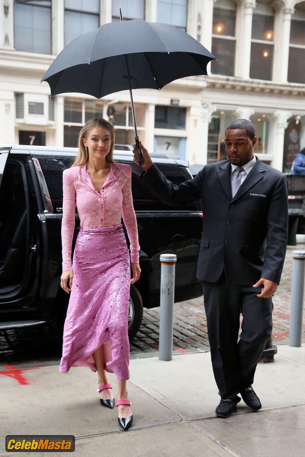 Gigi Hadid Pink Lace Blouse And Skirt in New York City photo 5