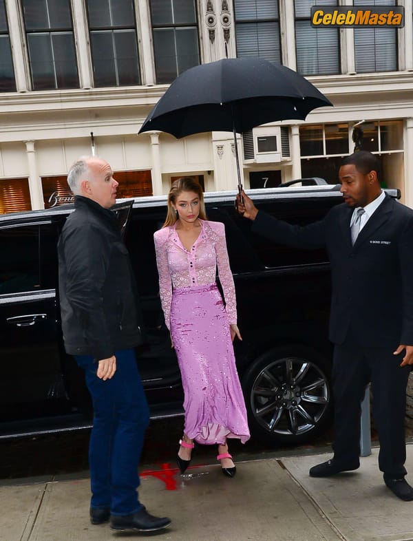 Gigi Hadid Pink Lace Blouse And Skirt in New York City photo 10
