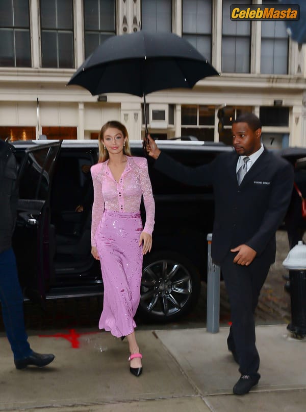 Gigi Hadid Pink Lace Blouse And Skirt in New York City photo 13