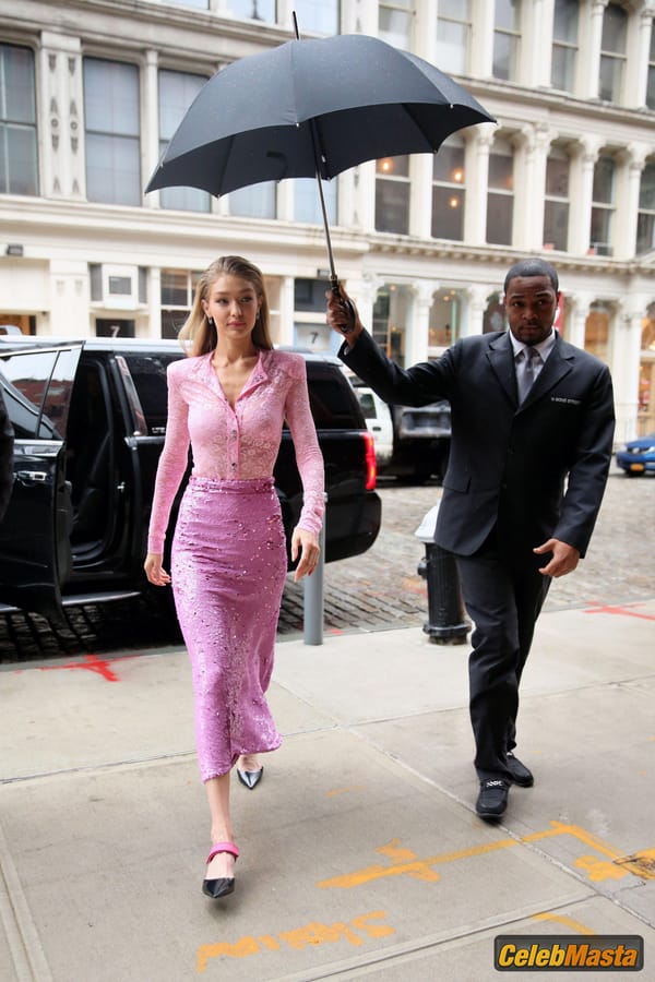 Gigi Hadid Pink Lace Blouse And Skirt in New York City photo 16