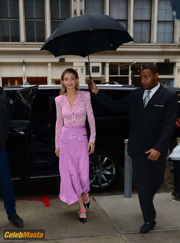 Gigi Hadid Pink Lace Blouse And Skirt in New York City photo 17