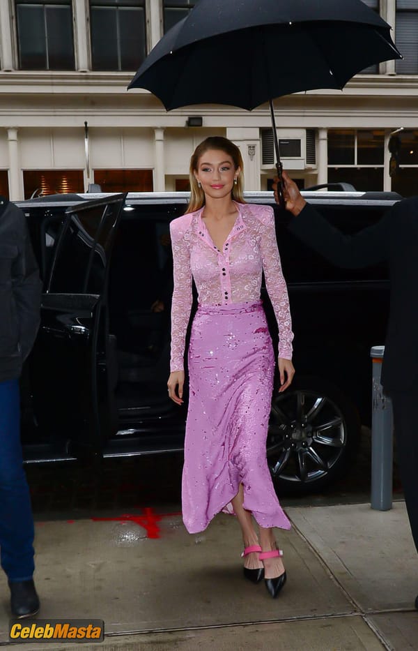 Gigi Hadid Pink Lace Blouse And Skirt in New York City photo 29