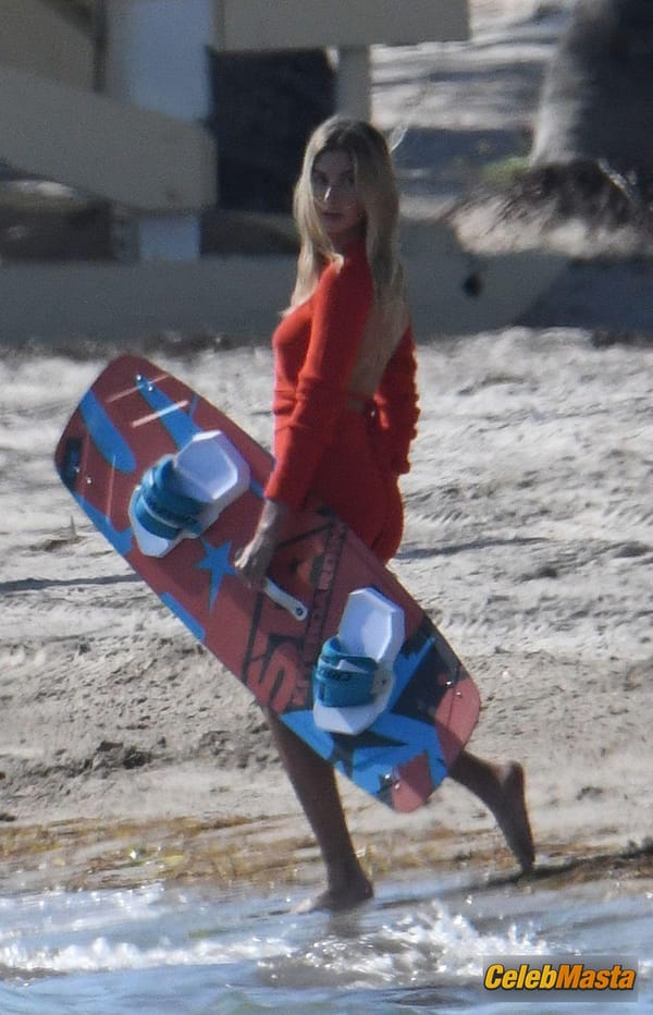Hailey Baldwin Bieber poses during a photoshoot on the beach in Miami photo 25