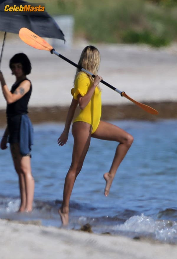 Hailey Baldwin Bieber poses during a photoshoot on the beach in Miami photo 33