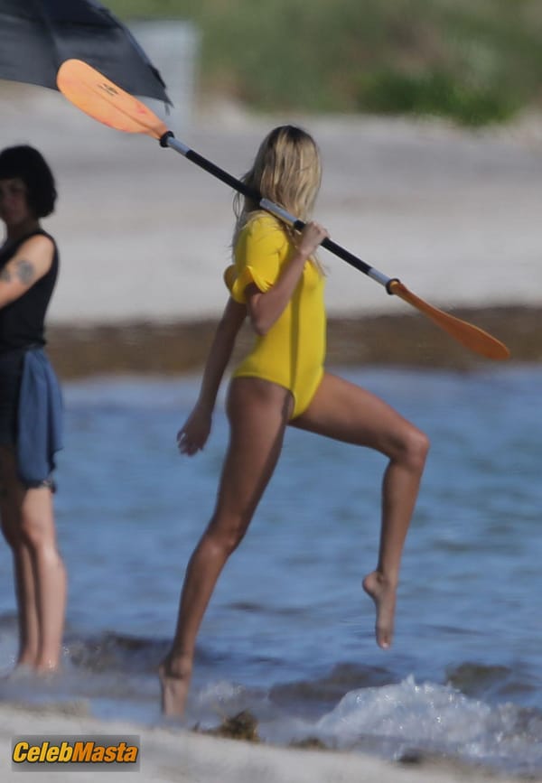Hailey Baldwin Bieber poses during a photoshoot on the beach in Miami photo 35